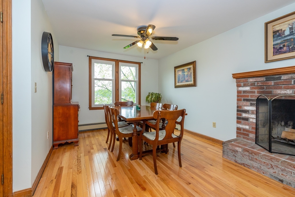 7 Adirondack Road Chelmsford, MA 01824 - Photo 13 of 31 a view of a dining room with furniture window and wooden floor