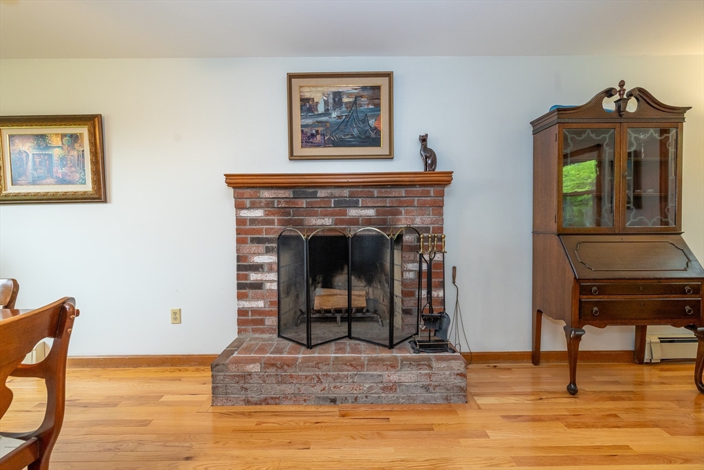 7 Adirondack Road Chelmsford, MA 01824 - Photo 14 of 31 a living room with furniture and a fireplace
