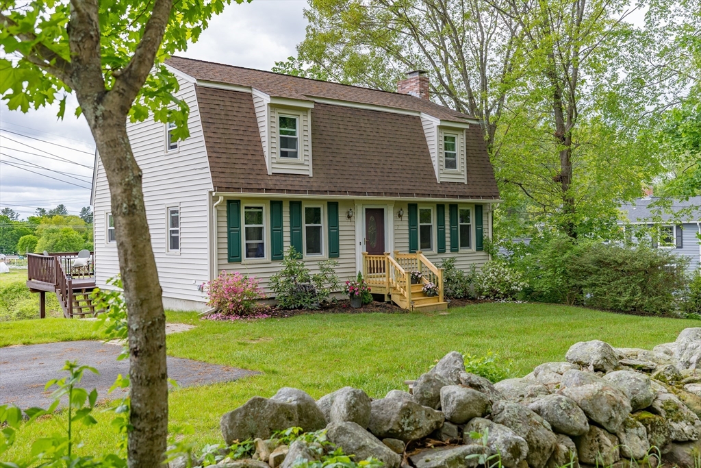 7 Adirondack Road Chelmsford, MA 01824 - Photo 20 of 31 a view of a house with backyard sitting area and garden