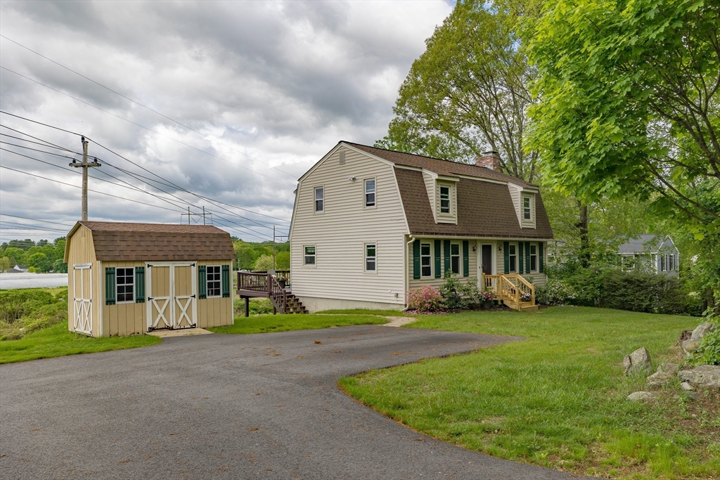 7 Adirondack Road Chelmsford, MA 01824 - Photo 21 of 31 a view of a house with a yard