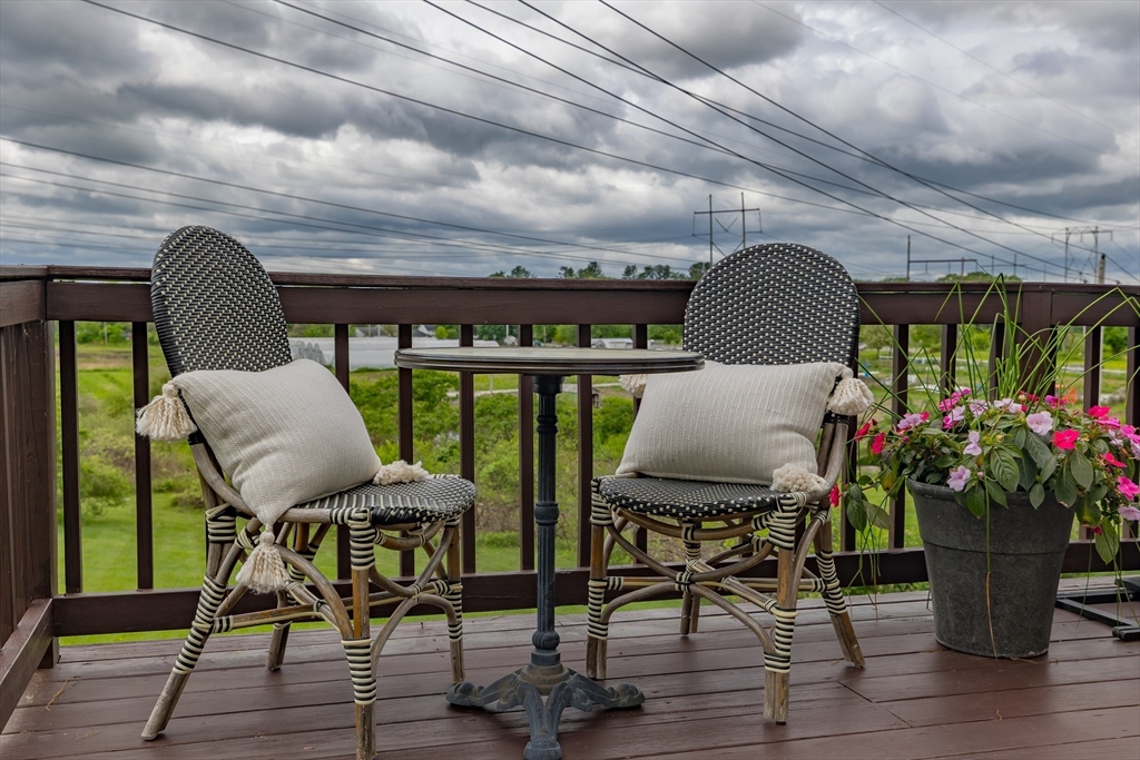7 Adirondack Road Chelmsford, MA 01824 - Photo 24 of 31 a view of a chairs and table in wooden floor