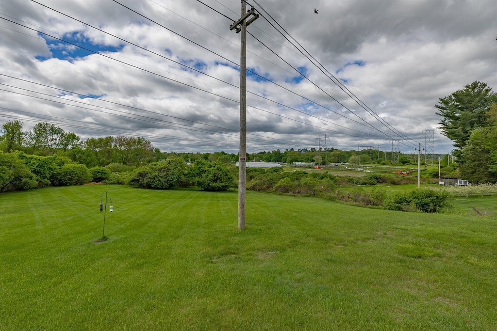 7 Adirondack Road Chelmsford, MA 01824 - Photo 29 of 31 a view of a green field
