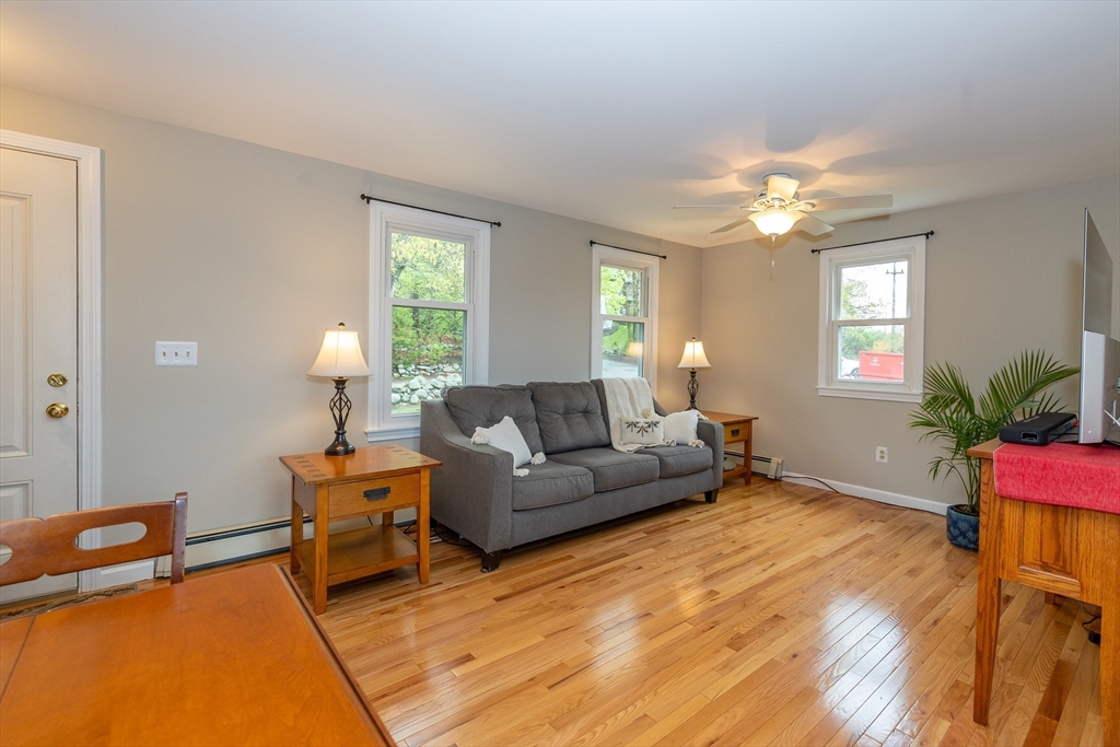 7 Adirondack Road Chelmsford, MA 01824 - Photo 7 of 31 a living room with furniture and a window