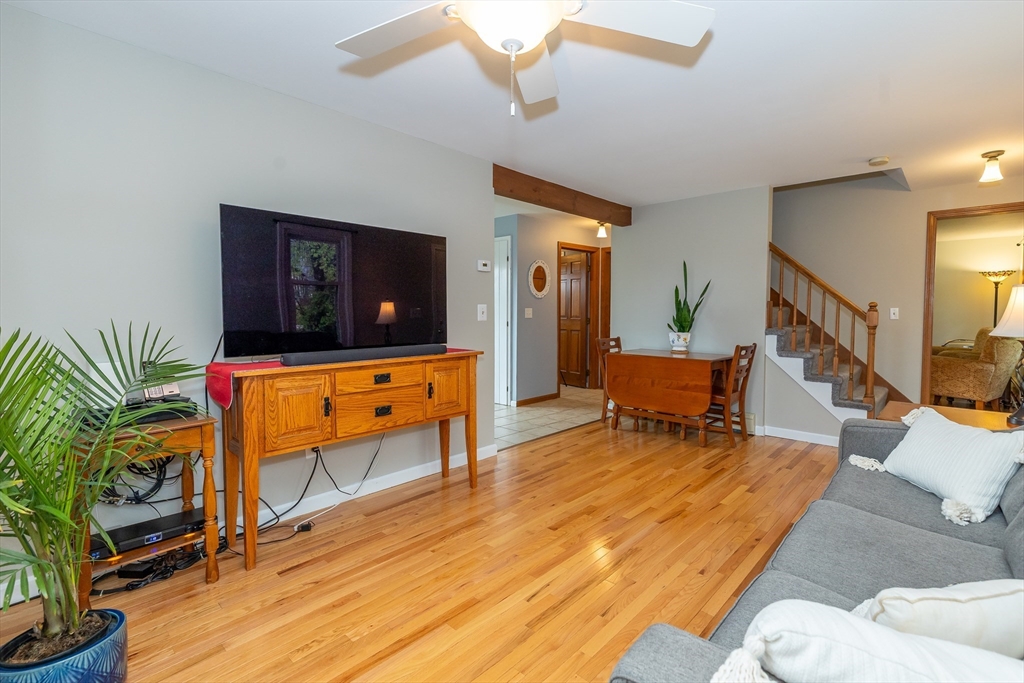 7 Adirondack Road Chelmsford, MA 01824 - Photo 9 of 31 a living room with furniture and a flat screen tv
