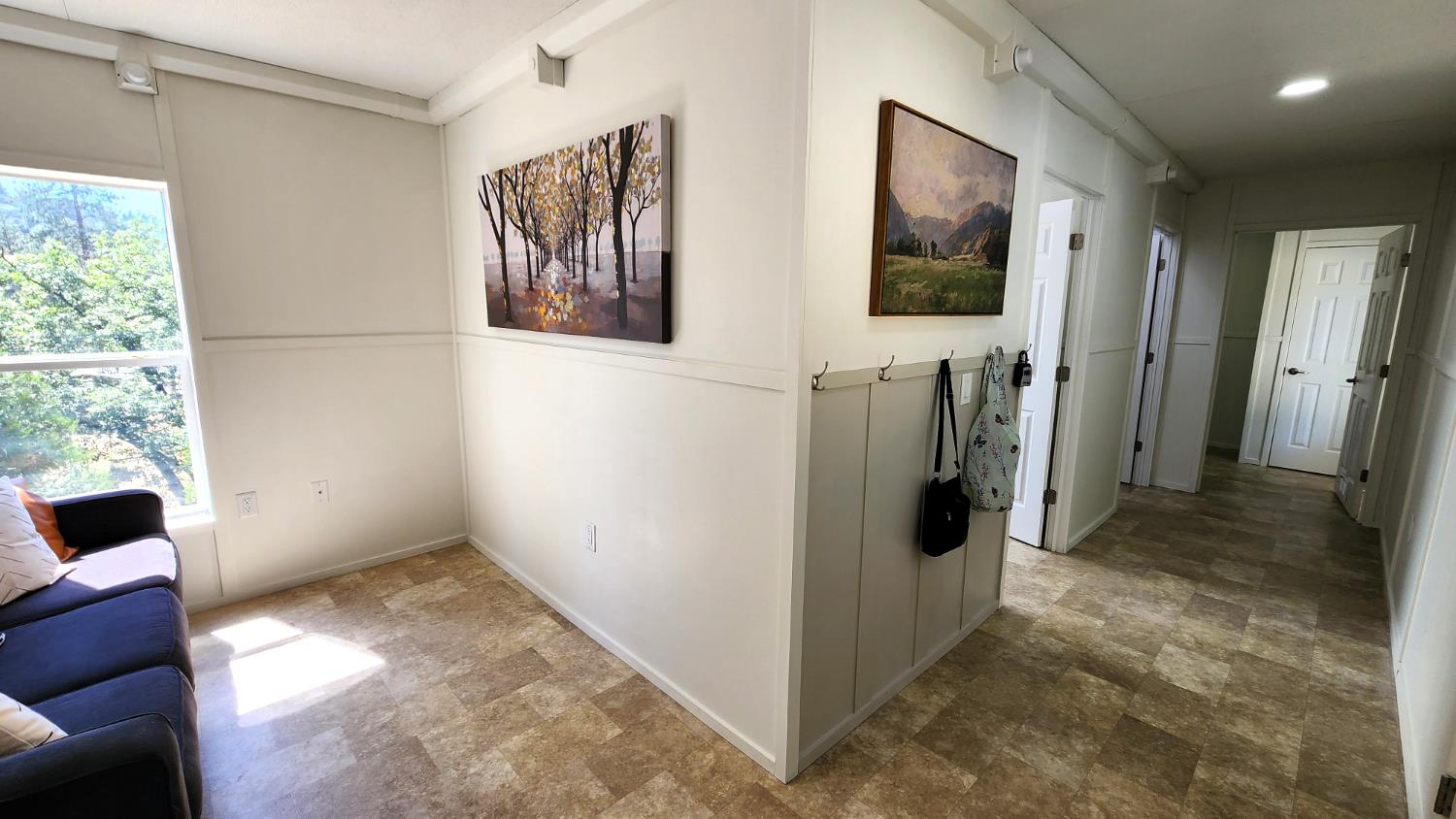 55062 Oak Crest Court Wishon, CA 93669 - Photo 15 of 57 a view of hallway with furniture and a window