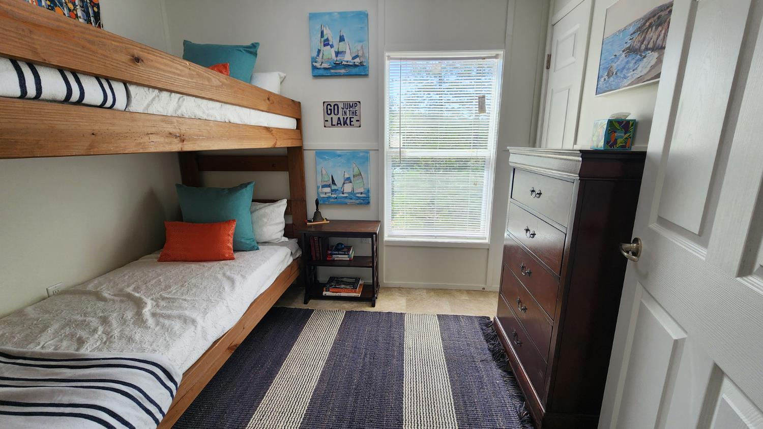 55062 Oak Crest Court Wishon, CA 93669 - Photo 18 of 57 a bedroom with a bed and wooden floor