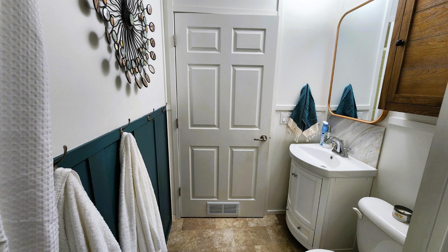 55062 Oak Crest Court Wishon, CA 93669 - Photo 21 of 57 a bathroom with a sink toilet and mirror