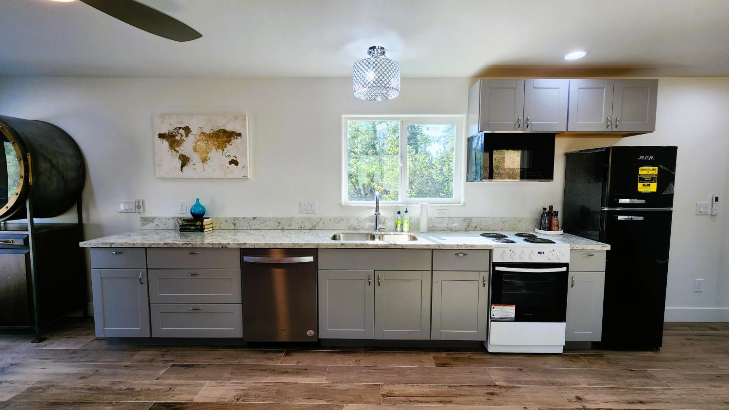 55062 Oak Crest Court Wishon, CA 93669 - Photo 27 of 57 a kitchen with a sink cabinets and window