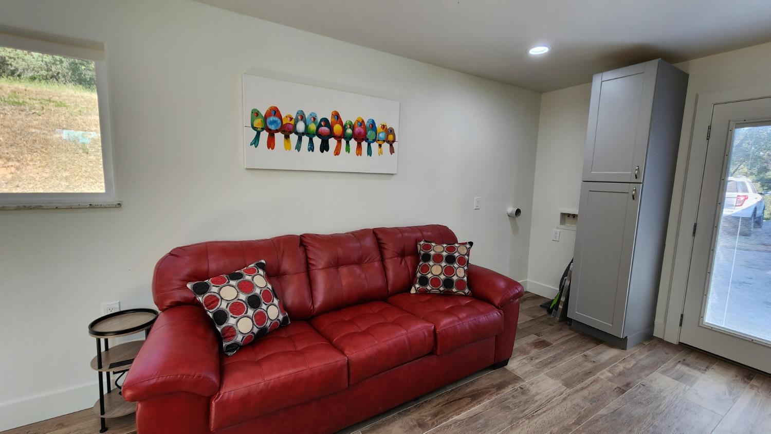 55062 Oak Crest Court Wishon, CA 93669 - Photo 28 of 57 a blue couch sitting in a living room with a rug