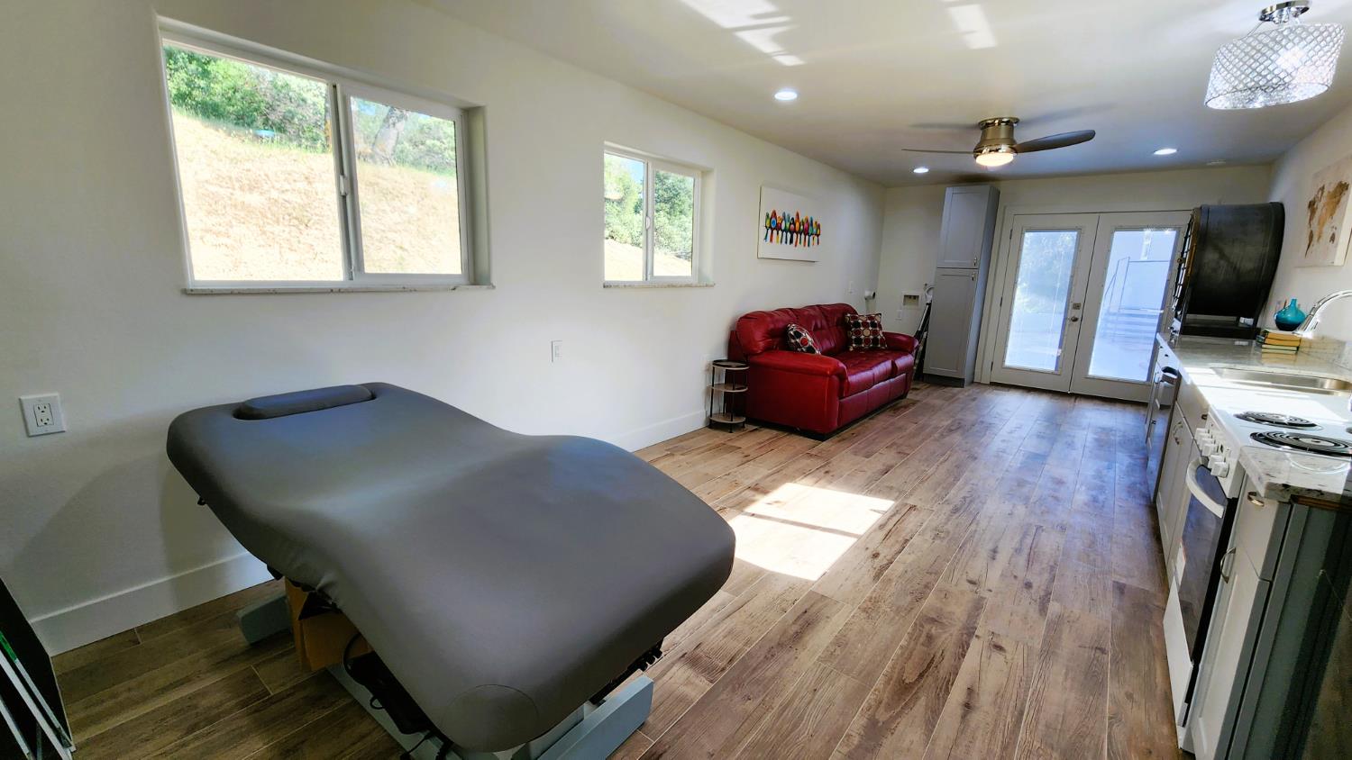 55062 Oak Crest Court Wishon, CA 93669 - Photo 29 of 57 a living room with furniture and a flat screen tv