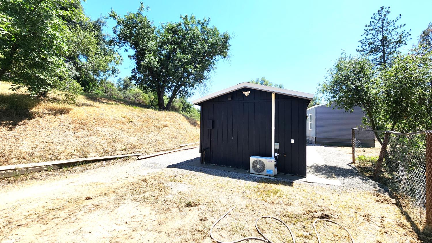 55062 Oak Crest Court Wishon, CA 93669 - Photo 34 of 57 a view of wooden fence and trees