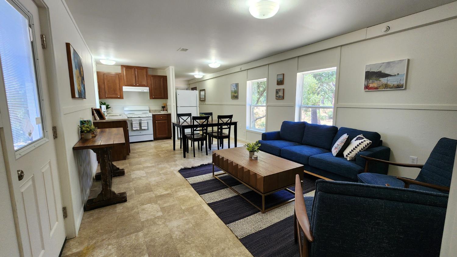 55062 Oak Crest Court Wishon, CA 93669 - Photo 40 of 57 a living room with furniture and a flat screen tv