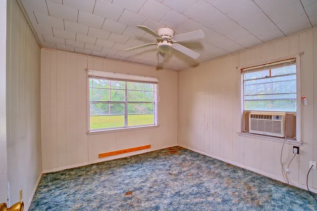 a view of an empty room and window