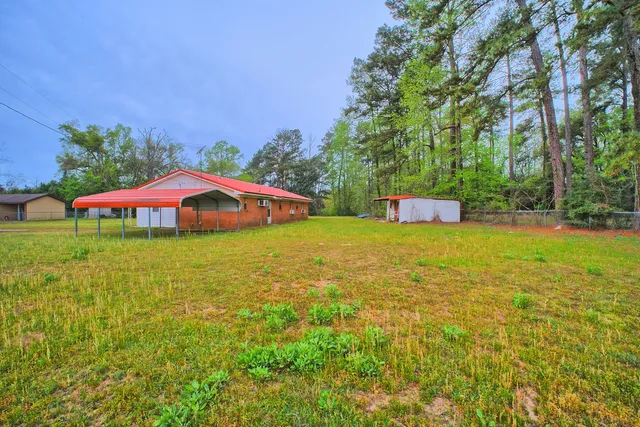 a view of a lake and swimming pool