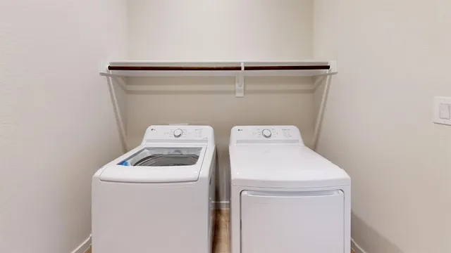 a white building with a black floor