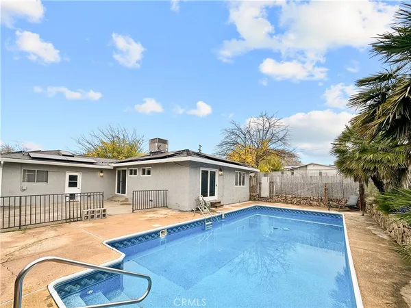 a front view of house with yard nad seating space