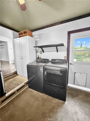a kitchen with granite countertop a stove and a refrigerator