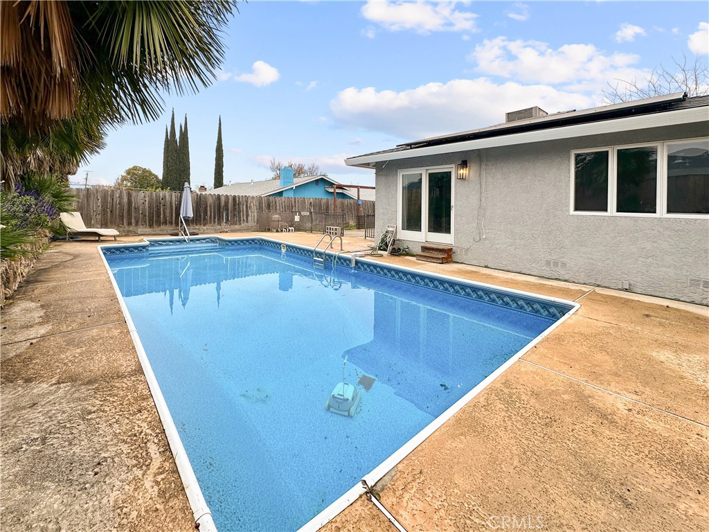 15 Regent Loop Oroville, CA 95966 - Photo 21 of 22 a swimming pool with outdoor seating
