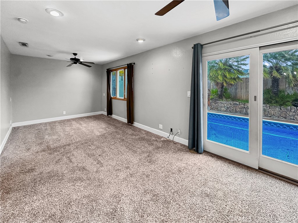 15 Regent Loop Oroville, CA 95966 - Photo 7 of 22 a view of an empty room with a window