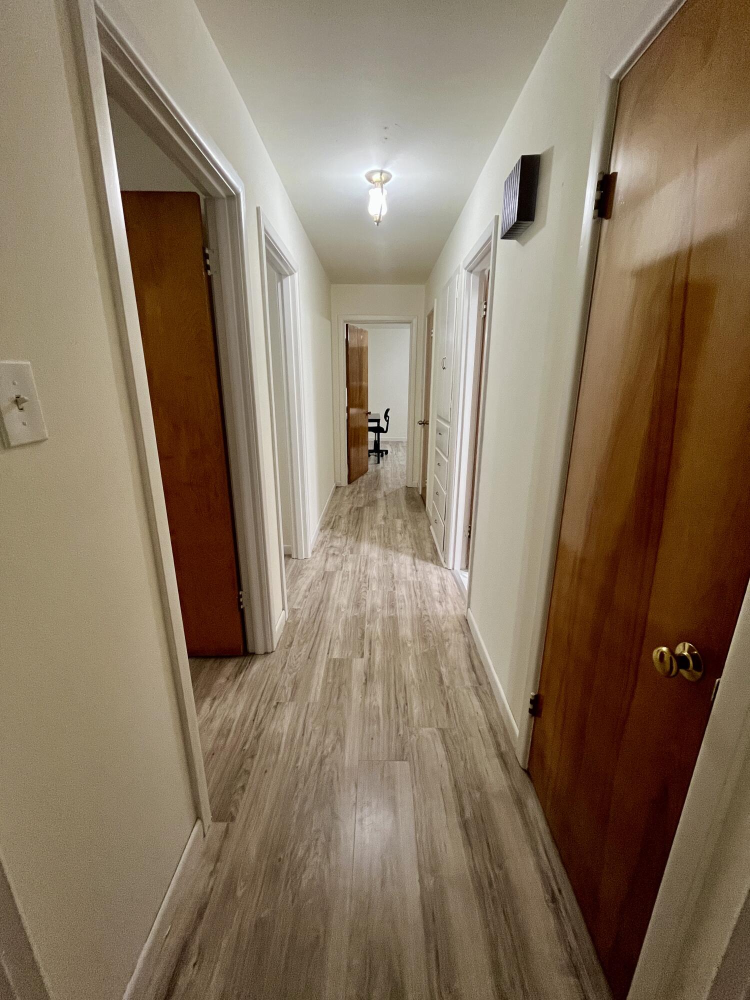 3506 46th Street Lubbock, TX 79413 - Photo 18 of 27 a view of a hallway and wooden floor