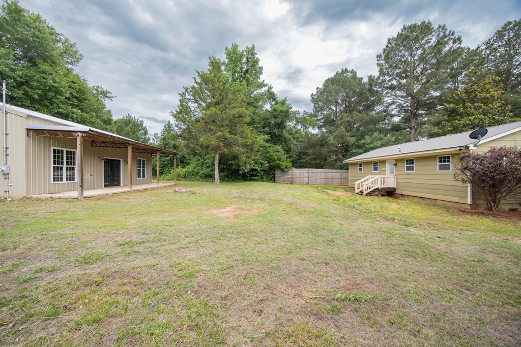 246 Sunnyside Church Road Pine Mountain, GA 31822 - Photo 20 of 26 a front view of house with deck and yard
