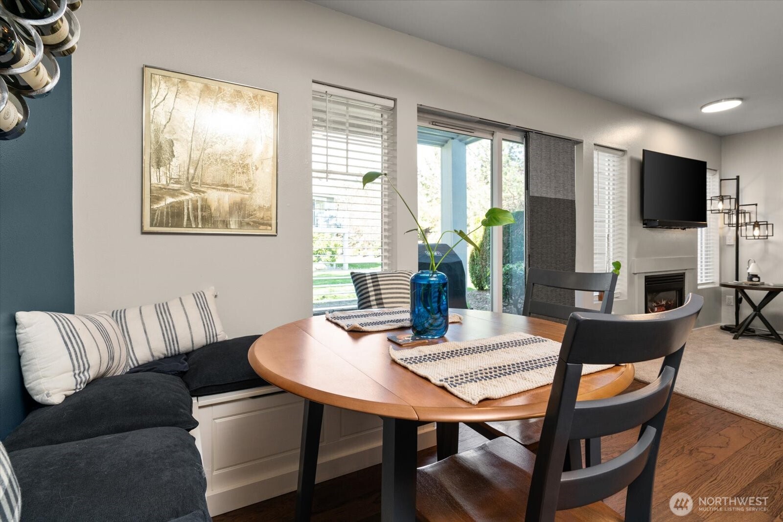 15150 140th Way Southeast, Unit T104 Renton, WA 98058 - Photo 13 of 40 a view of a dining room with furniture and a window