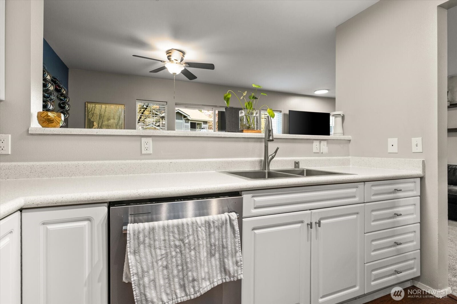 15150 140th Way Southeast, Unit T104 Renton, WA 98058 - Photo 18 of 40 a bathroom with a sink and a mirror