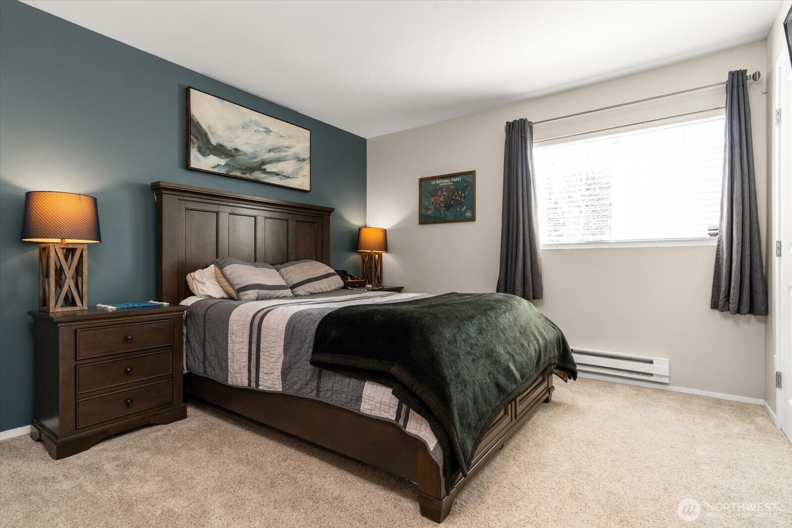 15150 140th Way Southeast, Unit T104 Renton, WA 98058 - Photo 20 of 40 a spacious bedroom with a bed and a window