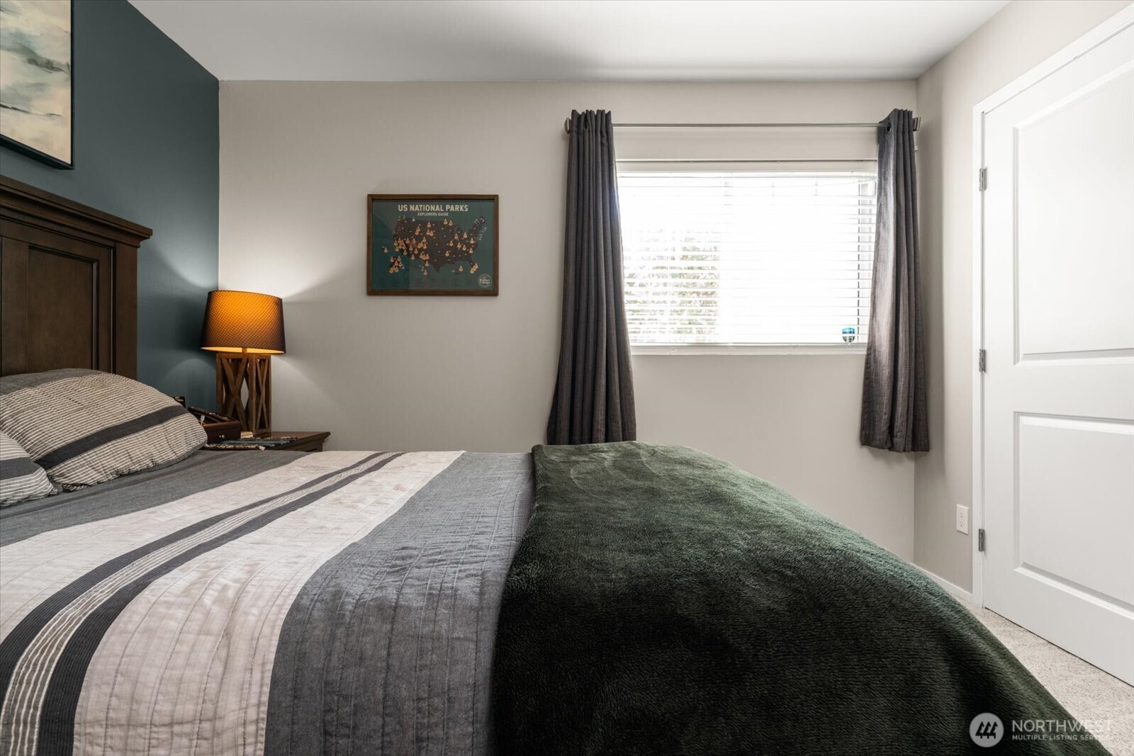 15150 140th Way Southeast, Unit T104 Renton, WA 98058 - Photo 21 of 40 a bedroom with a bed and a window