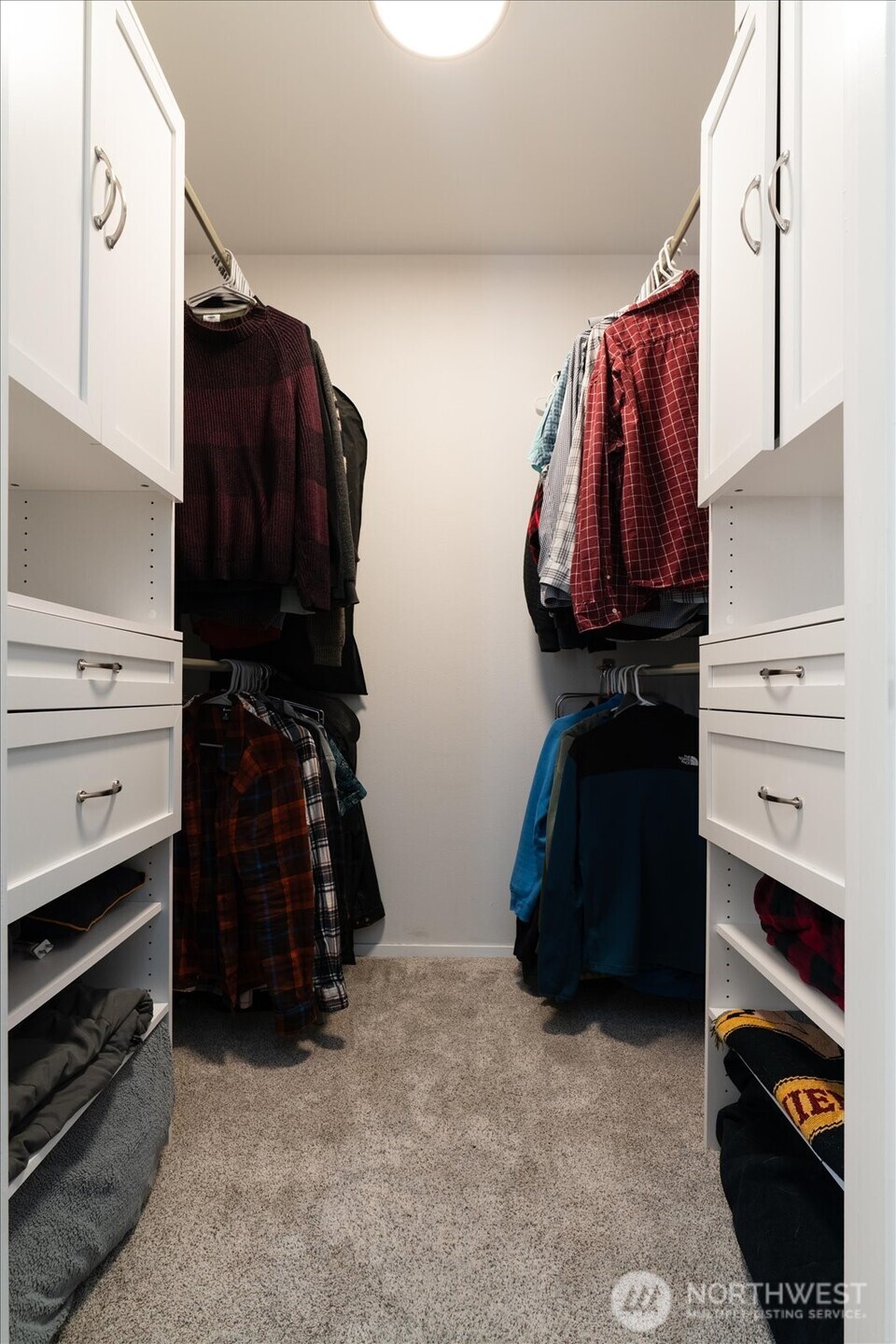 15150 140th Way Southeast, Unit T104 Renton, WA 98058 - Photo 23 of 40 a view of walk in closet