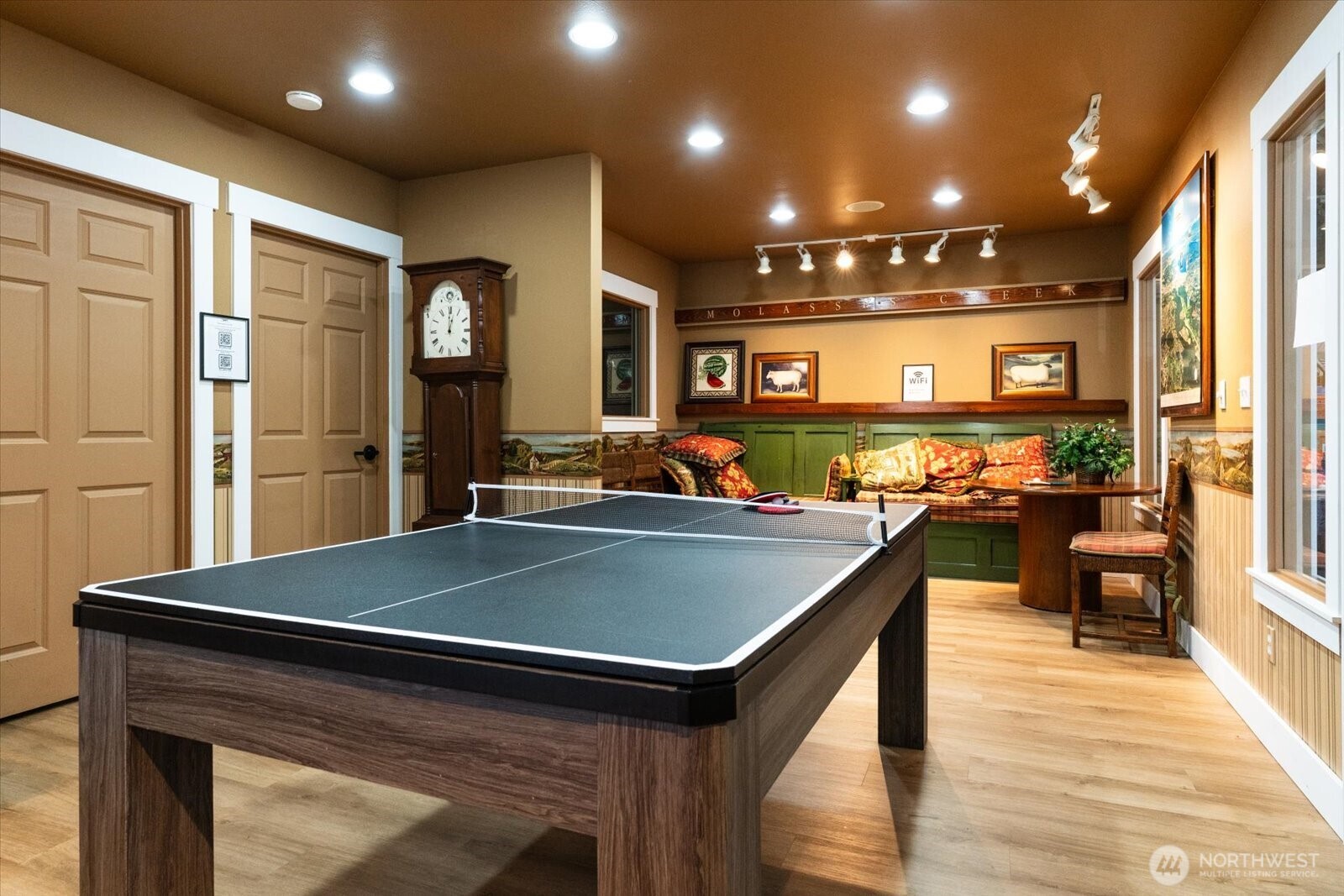 15150 140th Way Southeast, Unit T104 Renton, WA 98058 - Photo 37 of 40 a kitchen with stainless steel appliances granite countertop a sink and wooden cabinets
