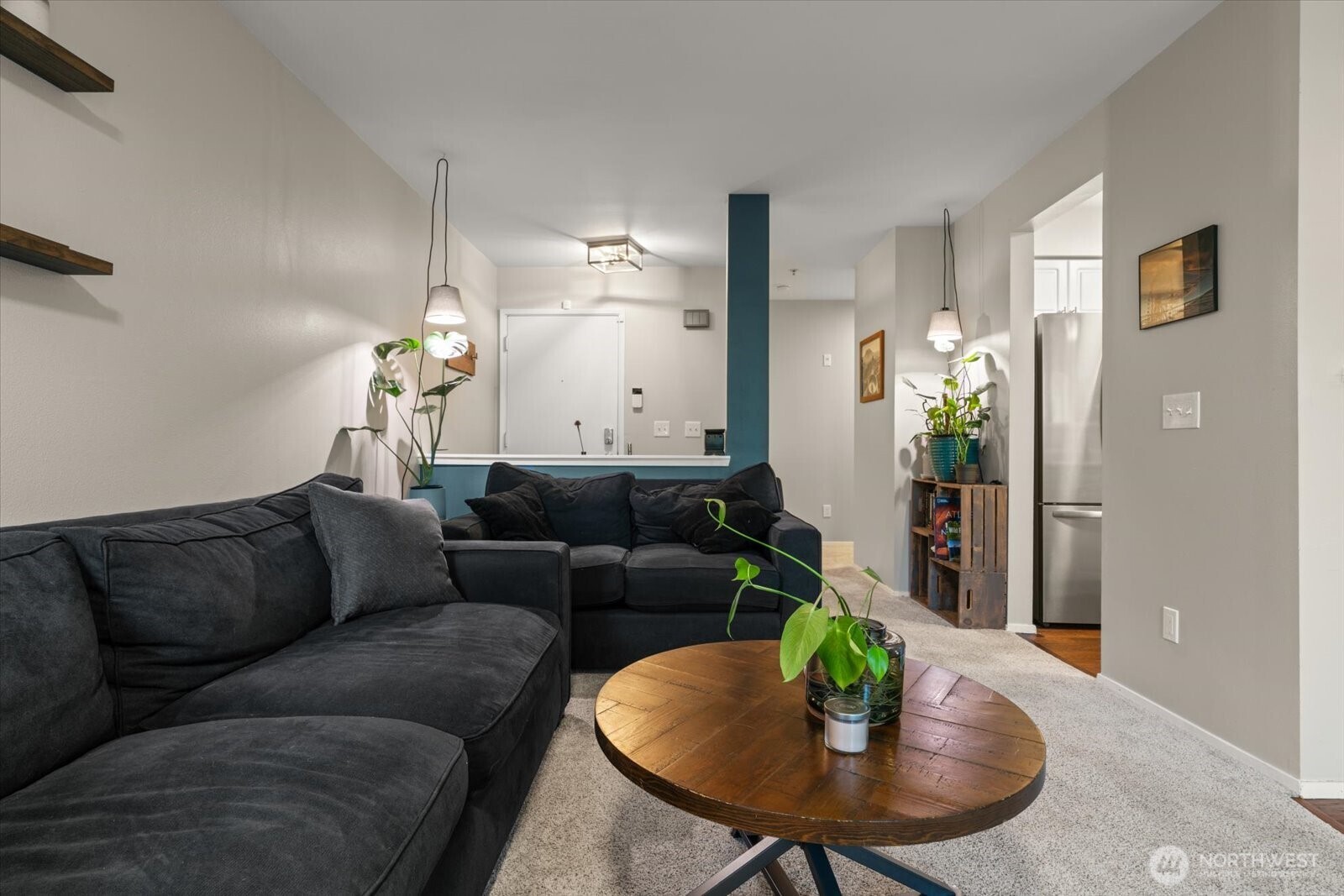 15150 140th Way Southeast, Unit T104 Renton, WA 98058 - Photo 8 of 40 a living room with furniture and a dining table
