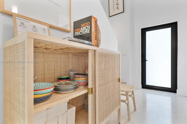 a living room with furniture and a table