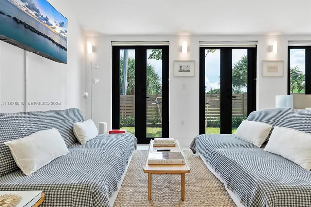 a bedroom with a bed and a lamp