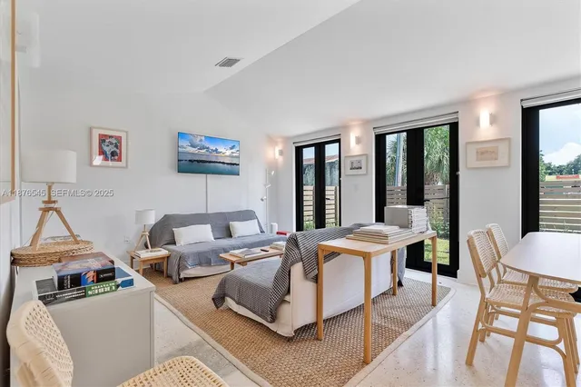 a close view of a utility room with dryer and washer
