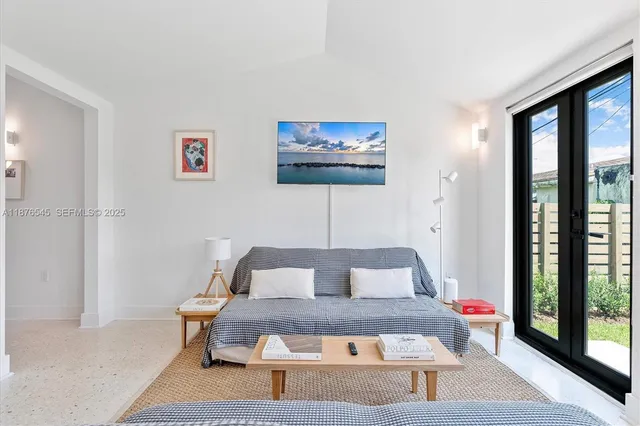 a view of a livingroom with furniture and wooden floor