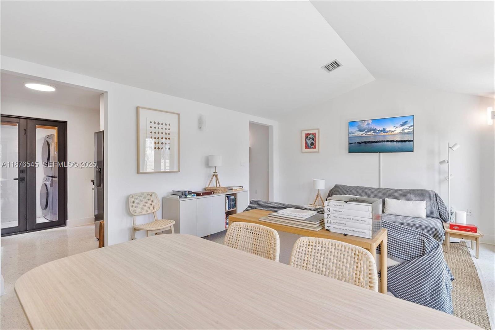 1076 Northwest 55th Street Miami, FL 33127 - Photo 22 of 96 a bedroom with a bed and a lamp