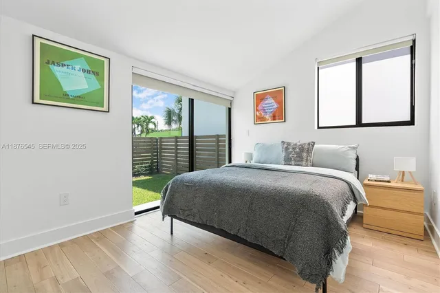 an aerial view of a house with swimming pool