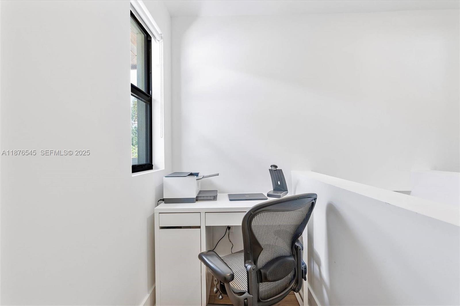 1076 Northwest 55th Street Miami, FL 33127 - Photo 44 of 96 a bathroom with a sink and a mirror