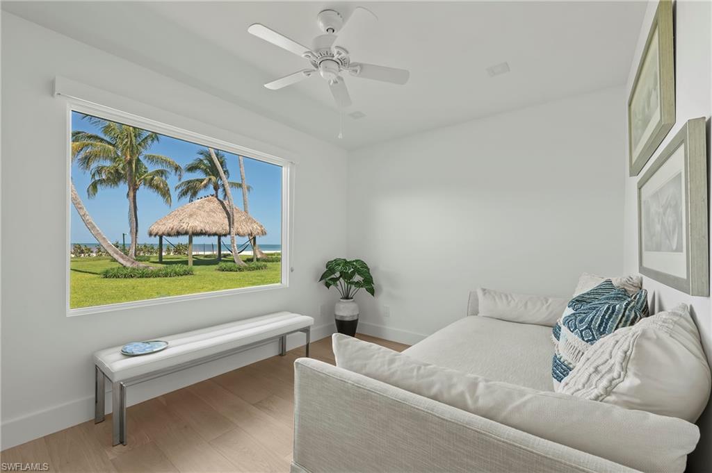 71 18th Avenue South Naples, FL 34102 - Photo 28 of 50 a living room with furniture and a large window