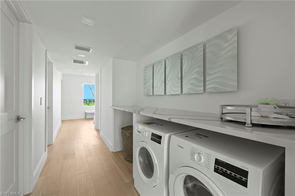 71 18th Avenue South Naples, FL 34102 - Photo 29 of 50 a view of entryway with washer and dryer
