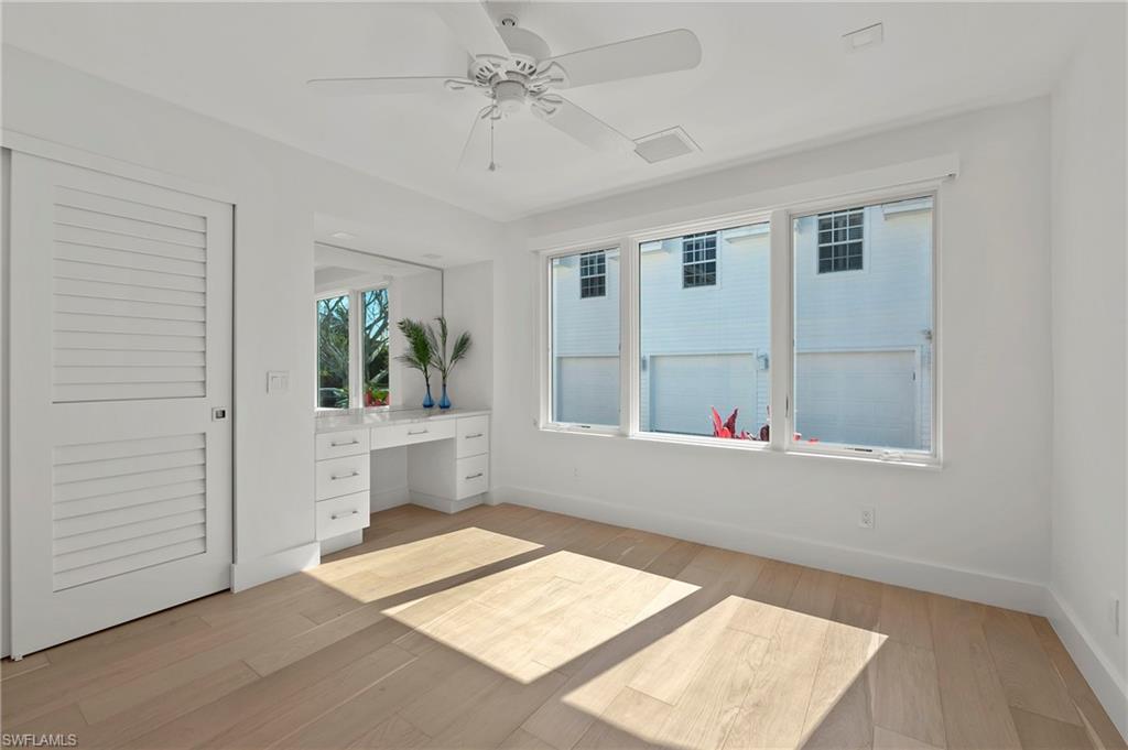 71 18th Avenue South Naples, FL 34102 - Photo 34 of 50 a view of an empty room with a window