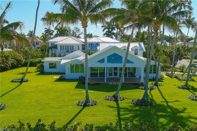 a view of a house with a swimming pool