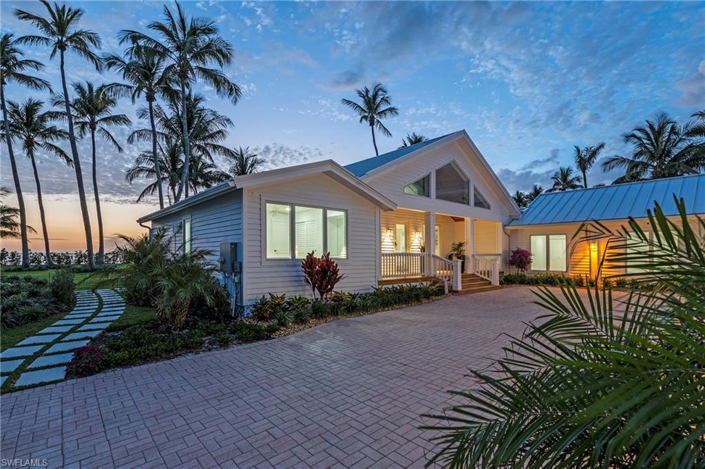 71 18th Avenue South Naples, FL 34102 - Photo 46 of 50 a view of a house with a patio