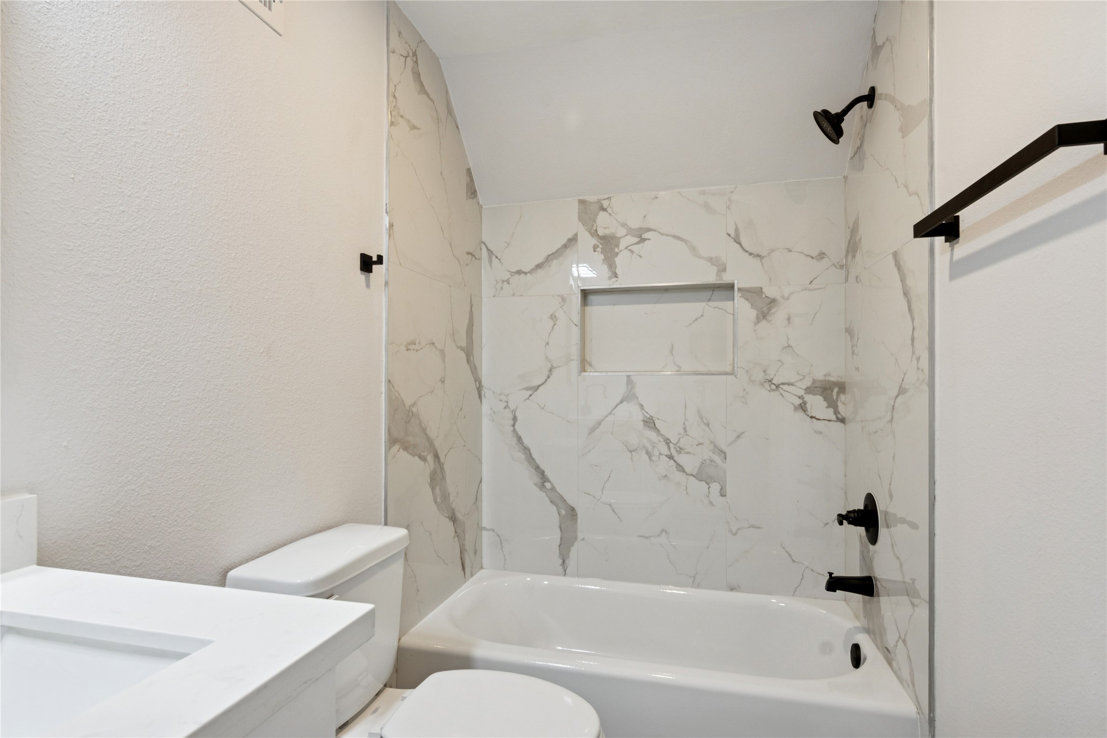 5766 Ward Bend Road Sealy, TX 77474 - Photo 39 of 45 a bathroom with a toilet and a bathtub