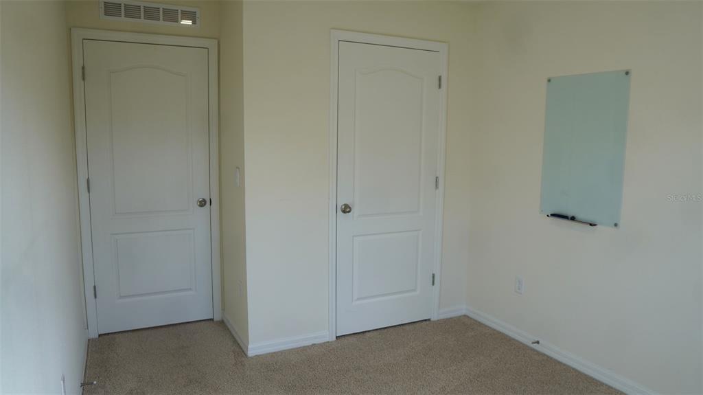 4079 Malawi Trail St. Cloud, FL 34772 - Photo 11 of 19 an empty room with closet area