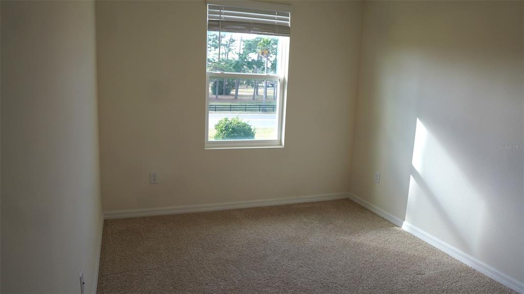 4079 Malawi Trail St. Cloud, FL 34772 - Photo 12 of 19 an empty room with a window