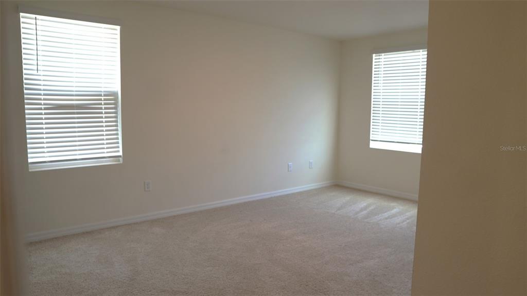4079 Malawi Trail St. Cloud, FL 34772 - Photo 13 of 19 an empty room with windows