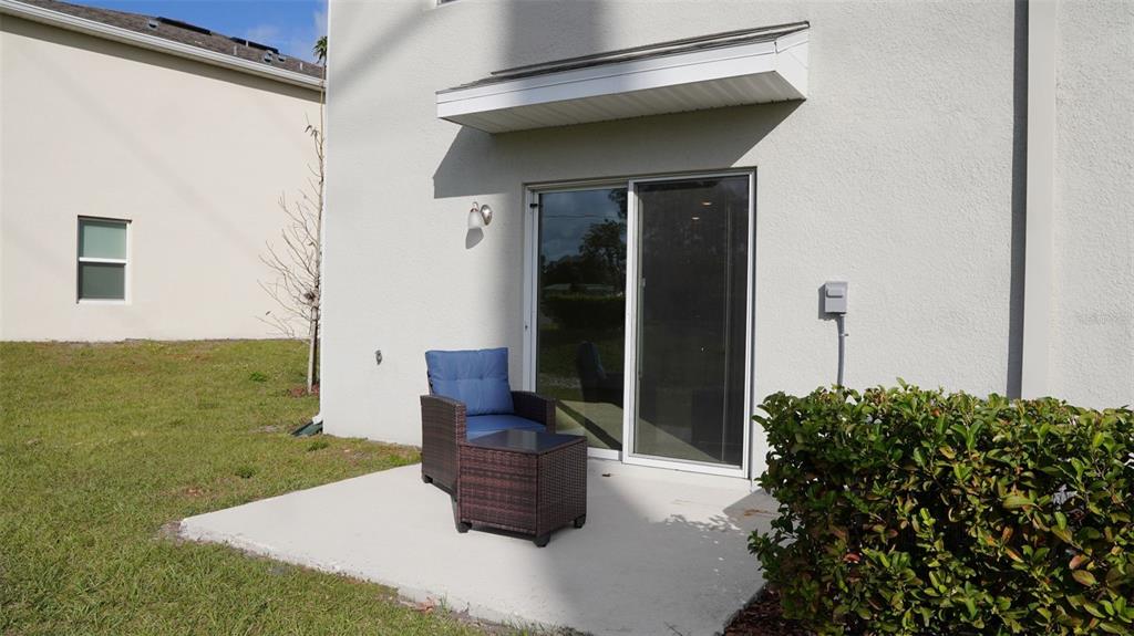4079 Malawi Trail St. Cloud, FL 34772 - Photo 19 of 19 a living room with garden