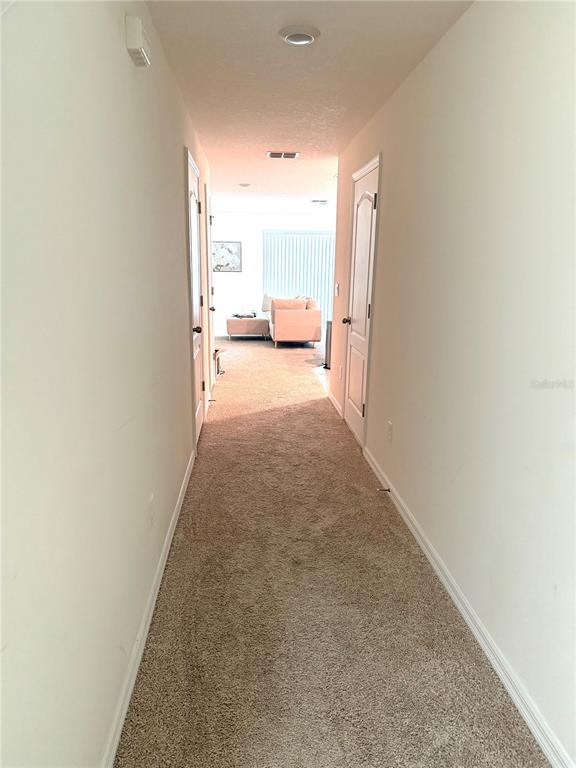 4079 Malawi Trail St. Cloud, FL 34772 - Photo 4 of 19 a view of a livingroom with a furniture and window